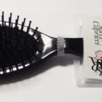 Item 160328 Oval Pneumatic Hair Brush - Plastic Bristles - Sizes cm 21,9 x 6 - Black 1 pc on Hangable Header Card - Cardboard Box of 12 pcs